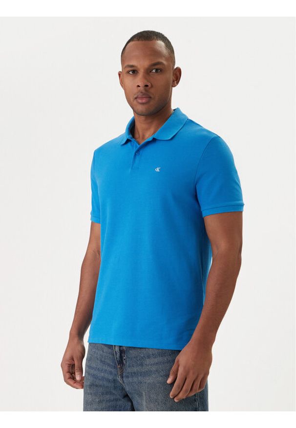 Calvin Klein Jeans Polo LV040EM269 Błękitny Regular Fit. Typ kołnierza: polo. Kolor: niebieski. Materiał: bawełna