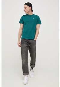 Tommy Jeans T-shirt bawełniany kolor zielony gładki. Okazja: na co dzień. Kolor: zielony. Materiał: bawełna. Wzór: gładki. Styl: casual