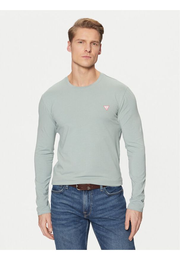 Guess Longsleeve M2YI28 J1314 Błękitny Slim Fit. Kolor: niebieski. Materiał: bawełna. Długość rękawa: długi rękaw