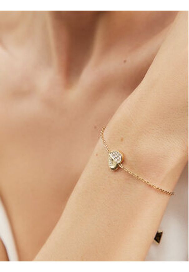Guess Bransoletka Lovely Guess JUBB03 036JW Żółte złocenie. Materiał: metalowe. Kolor: złoty