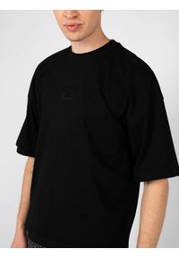 John Richmond T-Shirt | UMA24248TS | Mężczyzna | Czarny. Okazja: na co dzień. Kolor: czarny. Materiał: bawełna. Długość: długie. Styl: casual