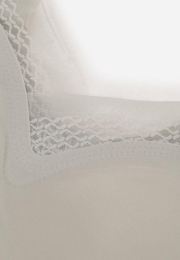 Renee - Szary Sportowy Biustonosz z Usztywnieniem Ozdobiony Siateczkową Wstawką Edalissa. Kolor: szary. Rodzaj stanika: wyciągane miseczki. Wzór: aplikacja