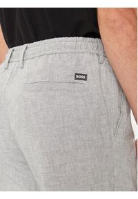 BOSS - Boss Spodnie materiałowe Kane-Ds 50512565 Granatowy Regular Fit. Kolor: niebieski. Materiał: bawełna, len