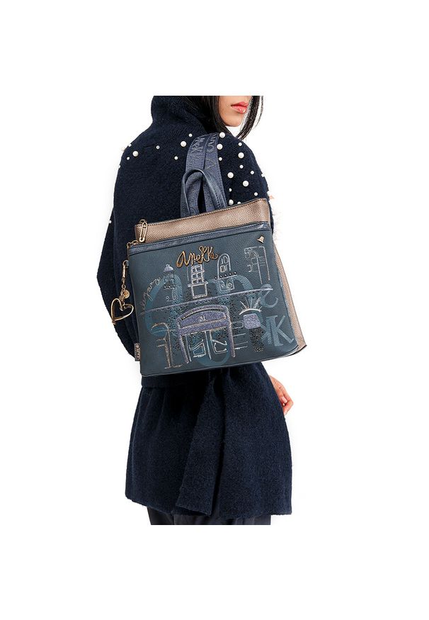 Plecak damski Anekke, we wzorki z 2 komorami z regulowanymi szelkami, granatowy, 41855-233. Kolor: niebieski. Materiał: materiał. Wzór: nadruk, haft, aplikacja. Styl: casual