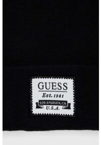 Guess czapka z domieszką wełny kolor czarny z grubej dzianiny. Kolor: czarny. Materiał: wełna, dzianina #3