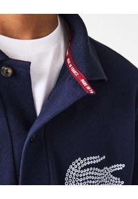Lacoste - LACOSTE - Granatowa koszulka polo z logo Regular Fit. Typ kołnierza: polo. Kolor: niebieski. Materiał: bawełna, prążkowany. Wzór: aplikacja, haft. Styl: klasyczny #2