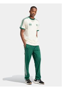 Adidas - adidas Spodnie dresowe IS1402 Zielony Regular Fit. Kolor: zielony. Materiał: syntetyk