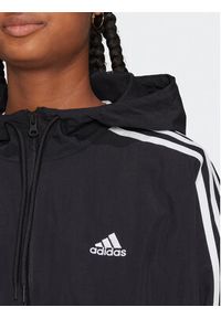 Adidas - adidas Wiatrówka Essentials 3-Stripes Woven Windbreaker HT3399 Czarny Loose Fit. Kolor: czarny. Materiał: syntetyk #7