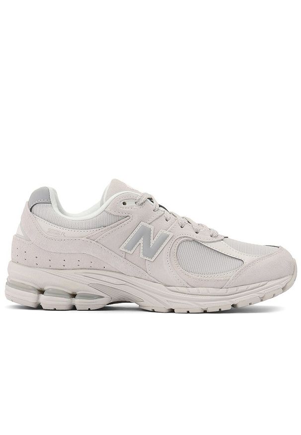 Buty unisex New Balance U2002RG - różowe. Kolor: różowy. Materiał: zamsz, guma. Szerokość cholewki: normalna