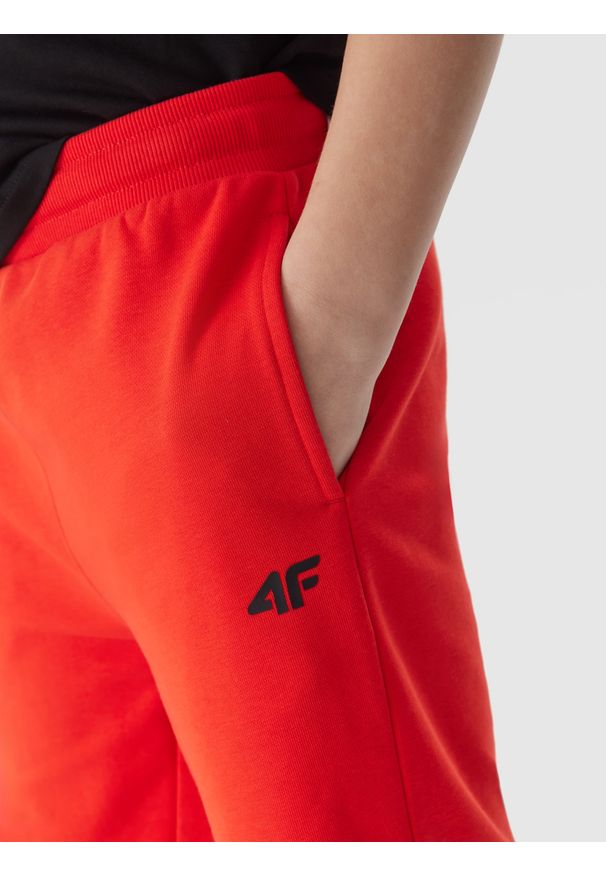 4f - 4F Spodenki dresowe chłopięce - pomarańczowe 140 (9-10 lat). Okazja: na co dzień. Kolor: pomarańczowy. Materiał: dresówka. Długość: krótkie. Wzór: gładki, ze splotem. Sezon: lato. Styl: casual, sportowy