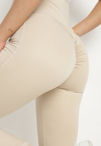 Born2be - Jasnobeżowe Legginsy Typu Dzwony z Wysokim Stanem Orralise. Stan: podwyższony. Kolor: beżowy. Materiał: tkanina. Styl: klasyczny #5