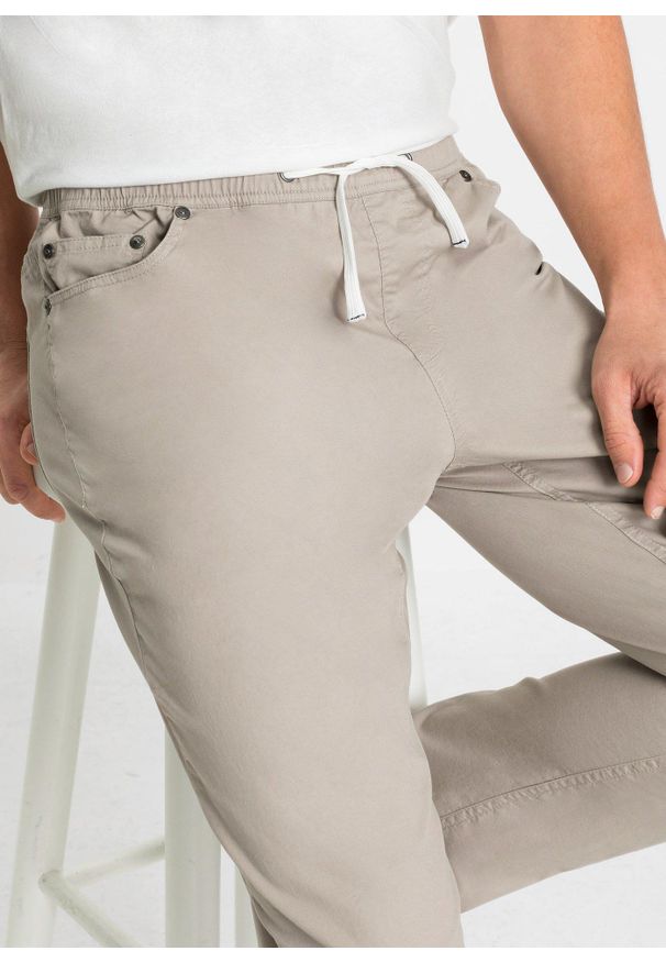 bonprix - Spodnie ze stretchem i elastyczną gumką w talii, regular fit, prosta nogawka. Kolor: szary
