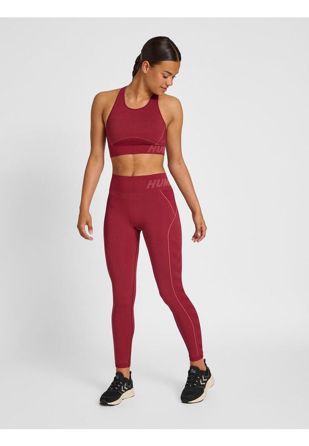 Legginsy bezszwowe damskie Hummel Christel. Kolor: czerwony. Materiał: dzianina, materiał, prążkowany. Wzór: jodełka. Sport: fitness