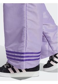 Adidas - adidas Spodnie dresowe Wide Leg Tracksuit Bottoms IC5443 Fioletowy. Kolor: fioletowy. Materiał: syntetyk