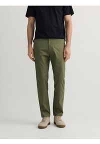 Reserved - Spodnie chino slim fit - oliwkowy. Kolor: oliwkowy. Materiał: tkanina, bawełna
