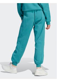 Adidas - adidas Spodnie dresowe ALL SZN Fleece IM0333 Niebieski Loose Fit. Kolor: niebieski. Materiał: bawełna #5