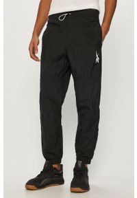 Reebok - Spodnie. Kolor: czarny. Materiał: tkanina #1