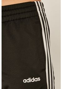 Adidas - adidas - Spodnie. Kolor: czarny. Materiał: bawełna, poliester, dzianina. Wzór: aplikacja #4