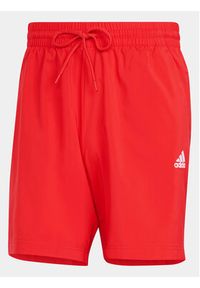 Adidas - adidas Szorty sportowe Essentials Chelsea Small Logo IC9394 Czerwony Regular Fit. Kolor: czerwony. Materiał: syntetyk. Styl: sportowy