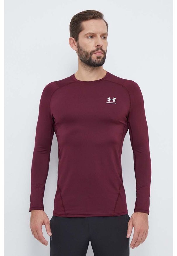 Under Armour longsleeve treningowy kolor bordowy gładki. Kolor: czerwony. Materiał: skóra, materiał. Długość rękawa: długi rękaw. Wzór: gładki