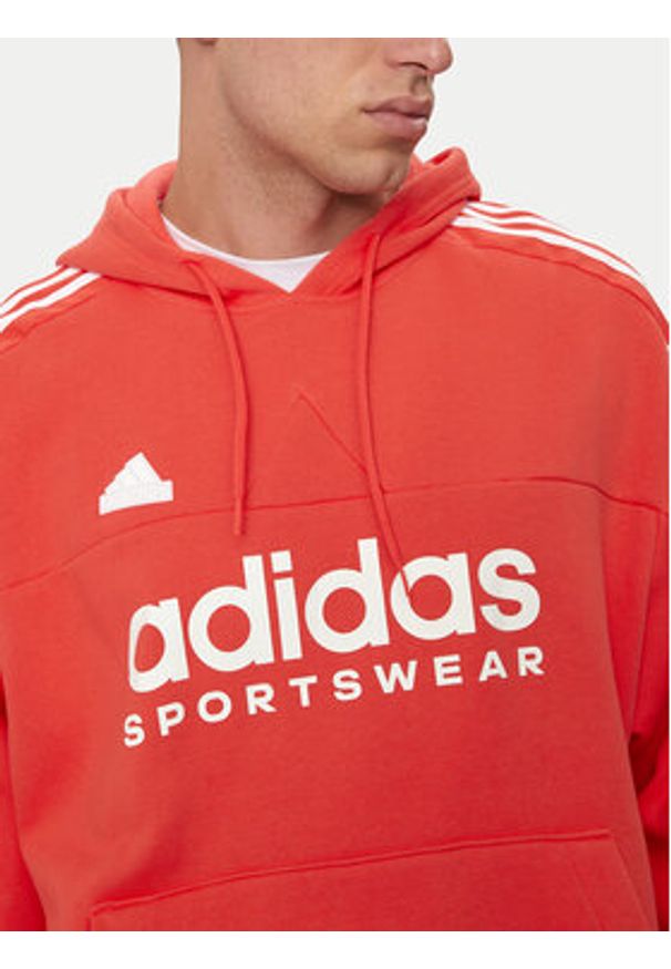 Adidas - adidas Bluza House of Tiro IV8123 Pomarańczowy Loose Fit. Kolor: pomarańczowy. Materiał: bawełna