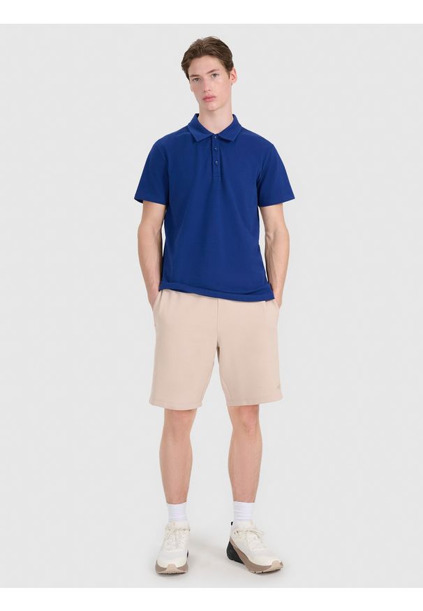 4f - 4F Koszulka polo regular męska - granatowa XL. Okazja: na co dzień. Typ kołnierza: polo. Kolor: niebieski. Materiał: jersey, dzianina, bawełna. Wzór: gładki, ze splotem. Styl: casual, klasyczny, sportowy