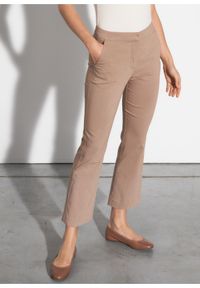 Ochnik - Beżowe spodnie damskie. Okazja: na co dzień. Kolor: beżowy. Materiał: materiał. Styl: casual #1