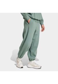 Adidas - Spodnie polarowe z efektem sprania ADIDAS ALL SZN. Kolor: zielony. Materiał: polar. Wzór: paski #2