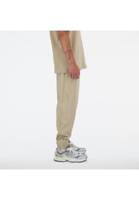Spodnie męskie New Balance MP41508SOT – beżowe. Kolor: beżowy. Materiał: tkanina, bawełna, dresówka #4