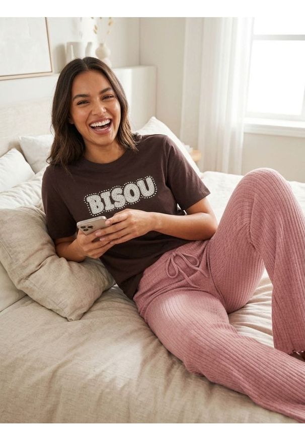 Sinsay - Spodnie dzwony - różowy. Kolor: różowy