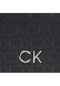 Calvin Klein Torebka Ck Daily Saddle Bag_Epi Mono K60K611879 Czarny. Kolor: czarny. Materiał: skórzane #5