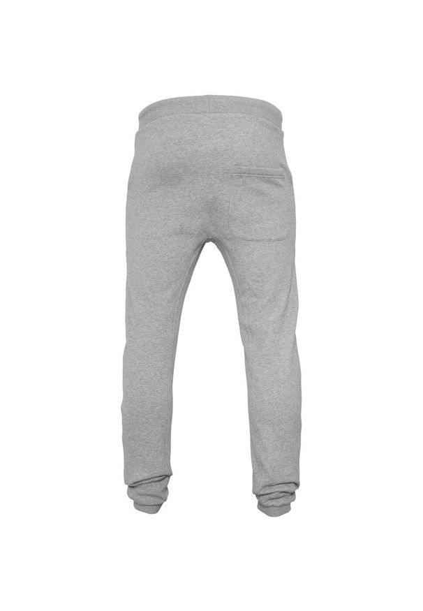 BUILD YOUR BRAND - Spodnie Dresowe Unisex Dla Dorosłych Z Głębokim Krokiem. Kolor: szary. Materiał: dresówka