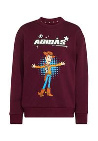 Adidas - adidas Spodnie dresowe Pixar Toy Story KG6131 Bordowy Regular Fit. Kolor: czerwony. Materiał: bawełna. Wzór: motyw z bajki #10