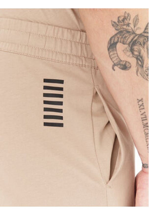 EA7 Emporio Armani Spodnie dresowe 8NPP67 PJVRZ U6155 Beżowy Regular Fit. Kolor: beżowy. Materiał: bawełna