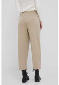 TOMMY HILFIGER - Tommy Hilfiger spodnie damskie kolor beżowy gładkie. Kolor: beżowy. Materiał: dzianina. Wzór: gładki #4