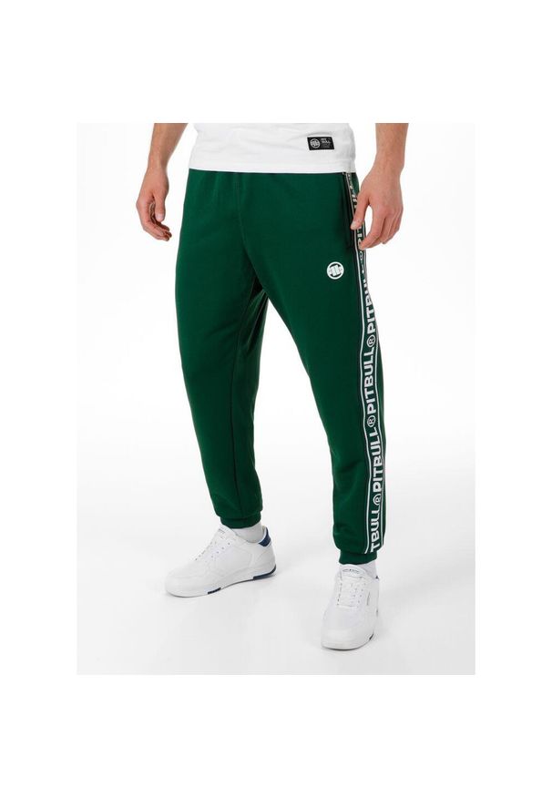 PITBULL - Spodnie męskie Oldschool Tape Logo. Kolor: zielony. Sport: fitness