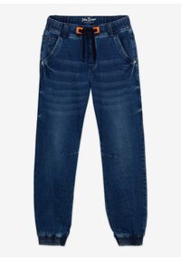 bonprix - Dżinsy dresowe chłopięce o kroju regular fit, tapered. Okazja: na uczelnię, na co dzień. Kolor: niebieski. Styl: casual #1