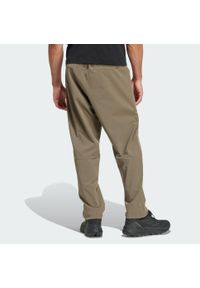 Adidas - Spodnie Multi Essentials Stretch. Kolor: beżowy. Materiał: materiał