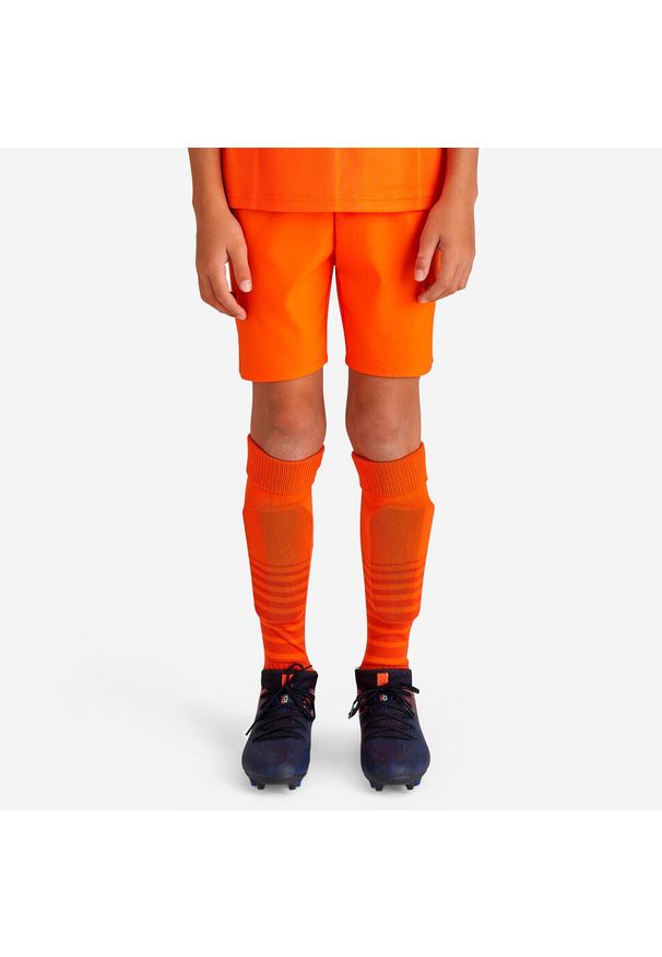 KIPSTA - Spodenki piłkarskie dla dzieci Kipsta Viralto Club. Kolor: pomarańczowy. Materiał: poliester, poliamid, materiał, elastan. Sezon: lato. Styl: sportowy