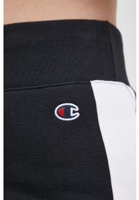 Champion Spodnie 114769 damskie kolor czarny z aplikacją. Stan: podwyższony. Kolor: czarny. Materiał: bawełna. Wzór: aplikacja #3