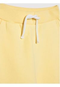 Name it - NAME IT Spodnie dresowe 13192135 Żółty Regular Fit. Kolor: żółty. Materiał: bawełna, dresówka