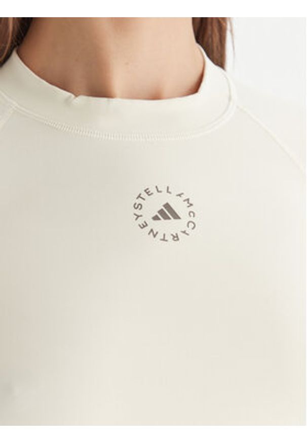 Adidas by Stella McCartney - adidas by Stella McCartney Koszulka techniczna Training JM1403 Beżowy Slim Fit. Kolor: beżowy. Materiał: syntetyk