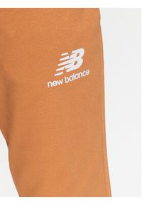 New Balance Spodnie dresowe MP31539 Żółty Regular Fit. Kolor: żółty. Materiał: bawełna