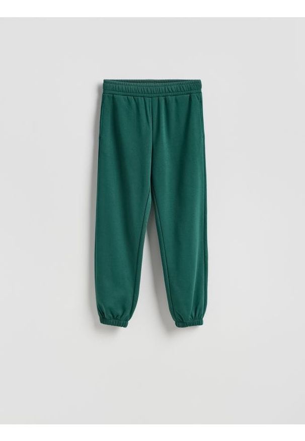 Reserved - Spodnie dresowe z bawełną - ciemnozielony. Kolor: zielony. Materiał: bawełna, dresówka