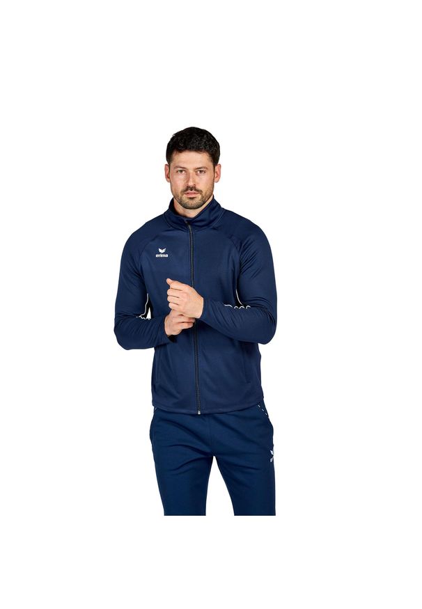 ERIMA - Poliestrowa bluza dresowa Erima Liga Star. Kolor: niebieski, wielokolorowy, biały. Materiał: poliester, dresówka. Długość rękawa: raglanowy rękaw. Sport: fitness, piłka ręczna