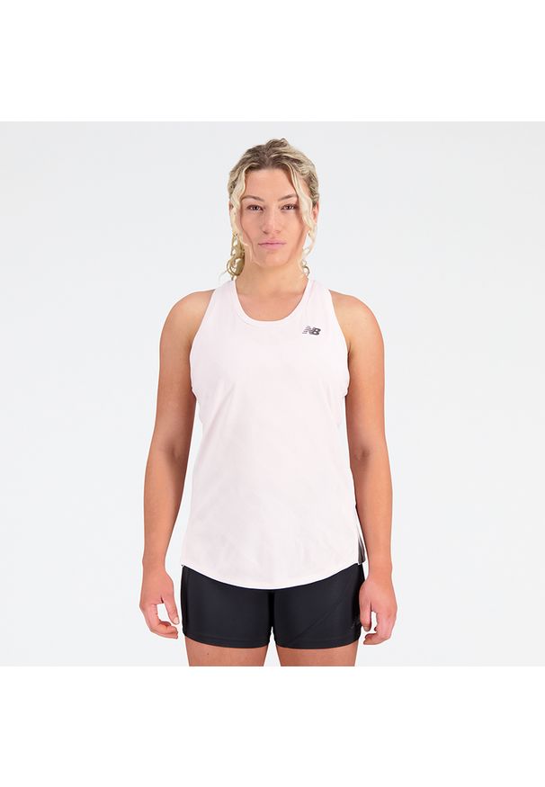 Koszulka damska New Balance WT23280SOI – różowa. Kolor: różowy. Materiał: poliester. Sezon: lato. Sport: fitness