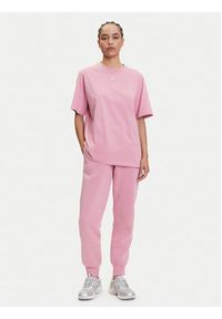 Nike Spodnie dresowe Sportswear Phoenix Fleece FZ7626 Różowy Regular Fit. Kolor: różowy. Materiał: bawełna