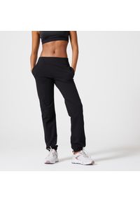 DOMYOS - Spodnie damskie Domyos Gym & Pilates 100 regular. Kolor: czarny. Materiał: materiał, bawełna, elastan. Sport: joga i pilates #1