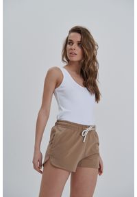 SPODENKI STELLA MACHIATTO L - Flawless. Okazja: na co dzień, na spacer. Materiał: dresówka, bawełna, elastan. Długość: długie. Sezon: lato. Styl: sportowy, casual