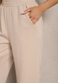 Renee - Beżowe Spodnie o Szerokim Kroju High Waist z Gumką w Pasie Belobira. Okazja: na co dzień. Stan: podwyższony. Kolor: beżowy. Długość: długie. Styl: wizytowy, elegancki, casual #5